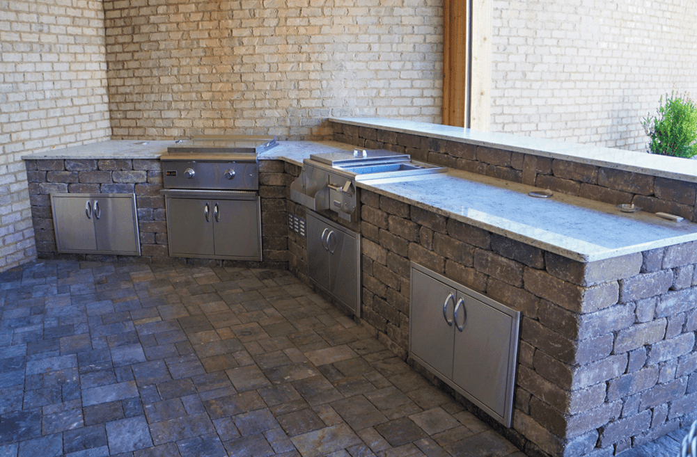 Outdoor kitchen with stone countertops