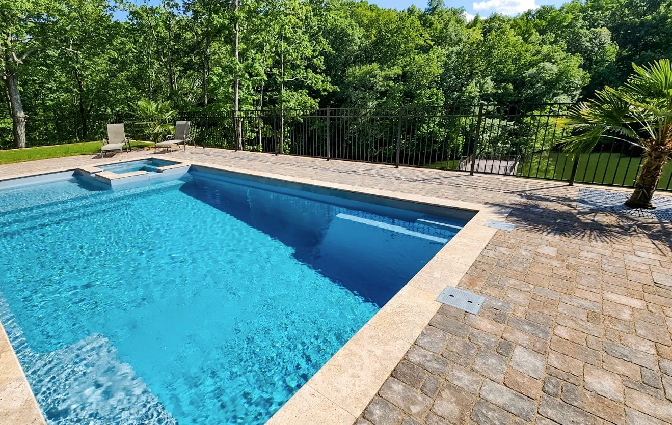 Poolside with lush green backdrop