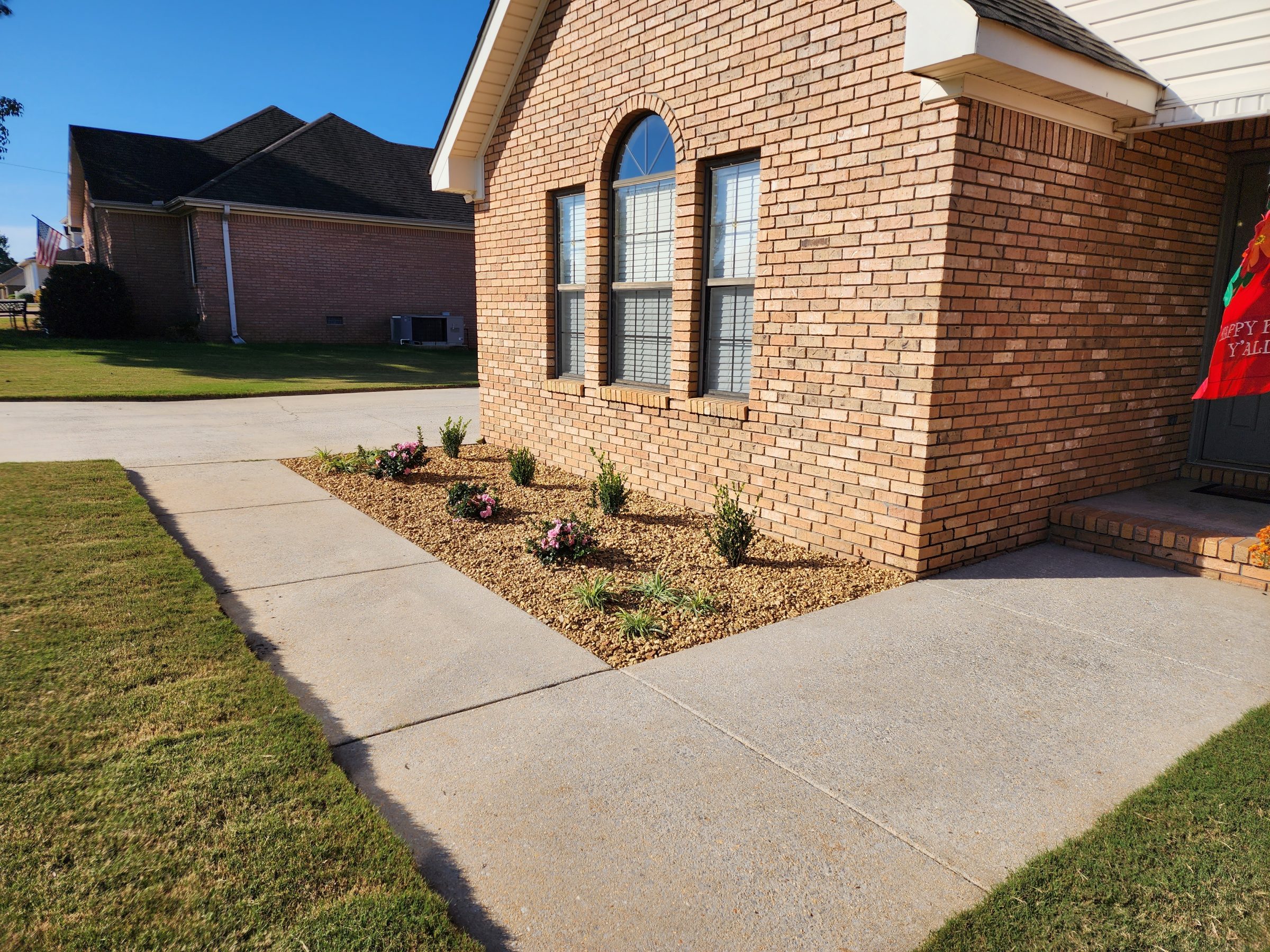 Brick house with landscaped garden