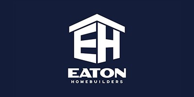 Eaton Homebuilders logo on dark background