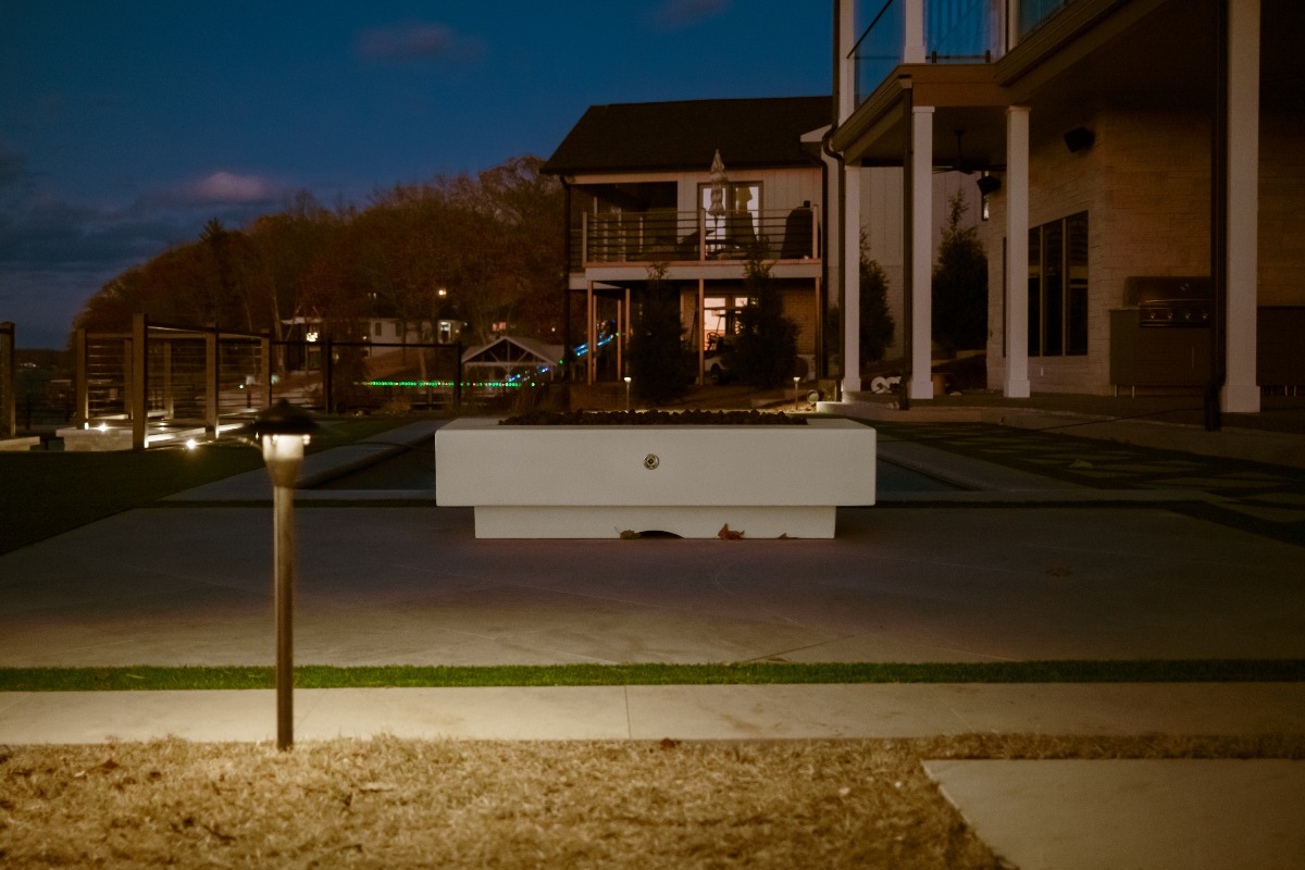 Modern outdoor fire pit at night