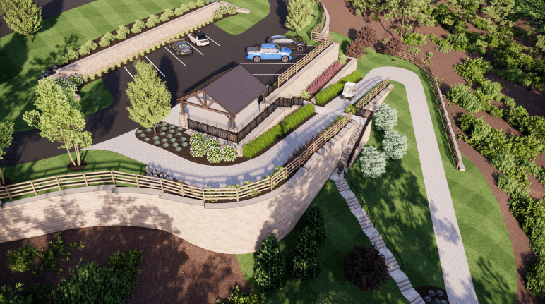 Scenic garden with pathway and parking area.